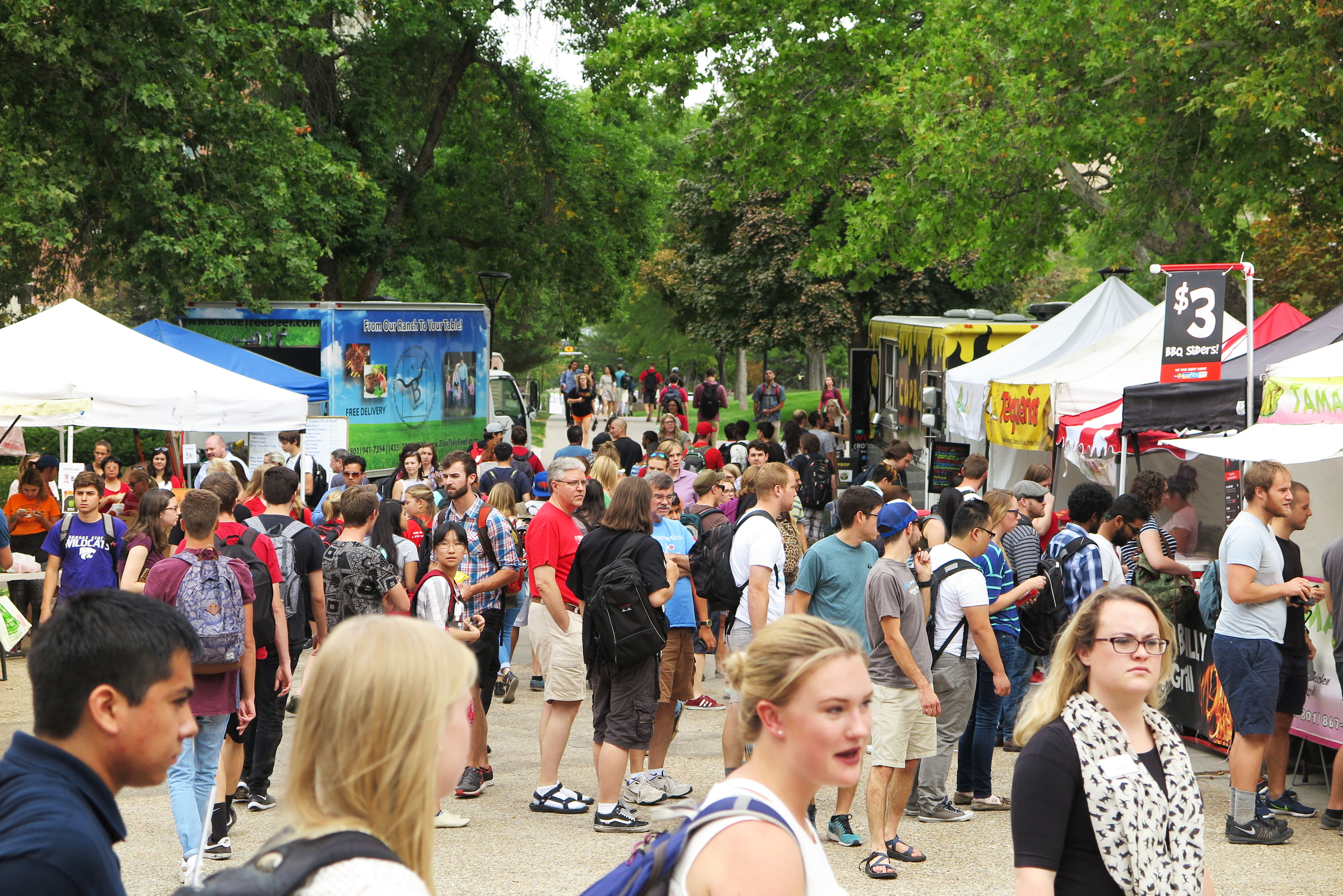 Students, community members, and faulty enjoying the University of Utah Farmers Market