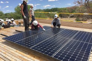 Solars panels are installed as part of Design Build Bluff in Southern Utah. The project was supported by the Sustainable Campus Initiative Fund.
